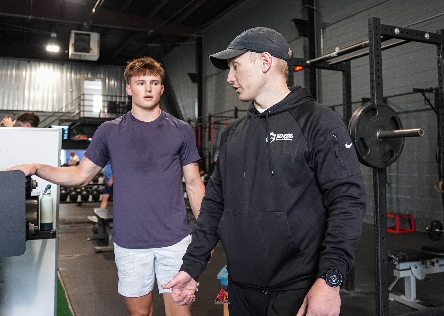 Athletes Acceleration coaches working with a group of young athletes